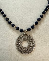 Image 1 of Lapis with silver tone spacers and silver tone pendant.
