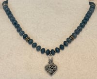 Image 1 of Chalcedony necklace with silver tone spacers and silver tone pendant.