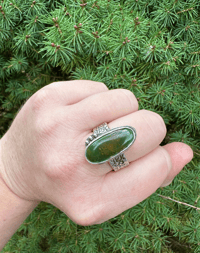 Image 2 of size 10 chunky green turquoise ring with engraved rose band