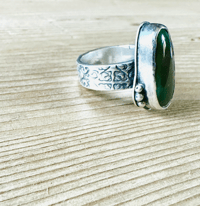Image 5 of size 10 chunky green turquoise ring with engraved rose band