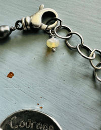 Image 7 of sterling silver courage dear heart medallion bracelet with gemstones 