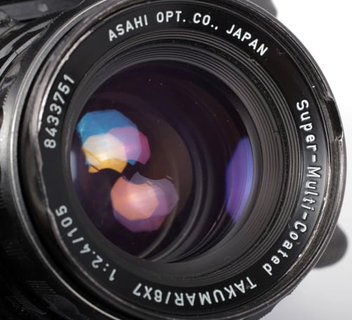 Image of Pentax 6X7 MLU camera with metered prism and SMC 105mm F2.4 lens + grips #0329