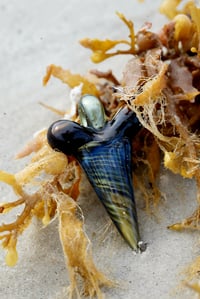 Image 1 of Elevtrum and sea slyme glass shark tooth pendant 🦈