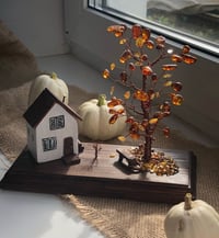 Image 1 of Wood house with amber