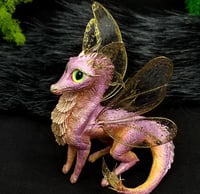 Image 1 of Pink dragon with butterfly wings