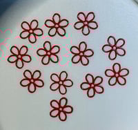 Flores de metal roja