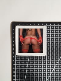 Image 2 of Magnificently Gorgeous Black Booty In Red Thong Glossy Finish Vinyl Sticker