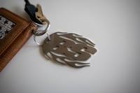 Image 1 of Reverse Flame Keychain / Shotgun Tool