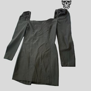 Image of elegant strong shoulder date night dress