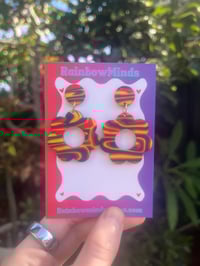 Team swirls earrings 