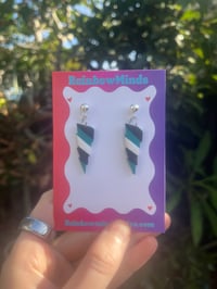 Strike of power earrings 