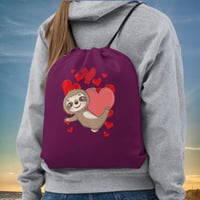 Sloth Hanging On To Heart Drawstring bag