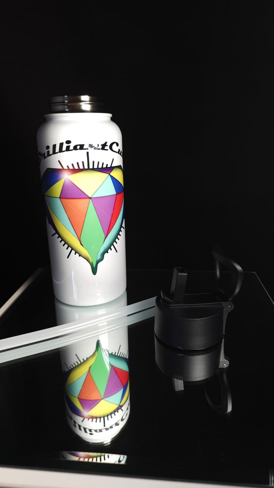 Image of Stainless steel water bottle with a straw lid