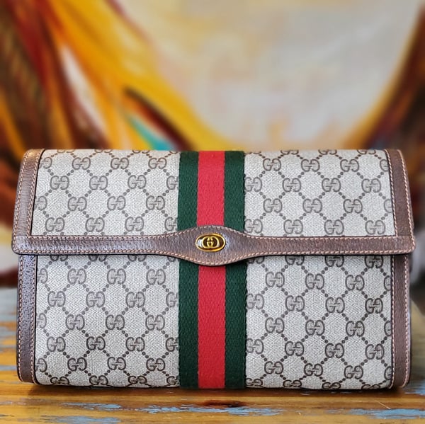 Image of Vtg. Gucci Large Brown Monogram Clutch.
