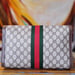 Image of Vtg. Gucci Large Brown Monogram Clutch.