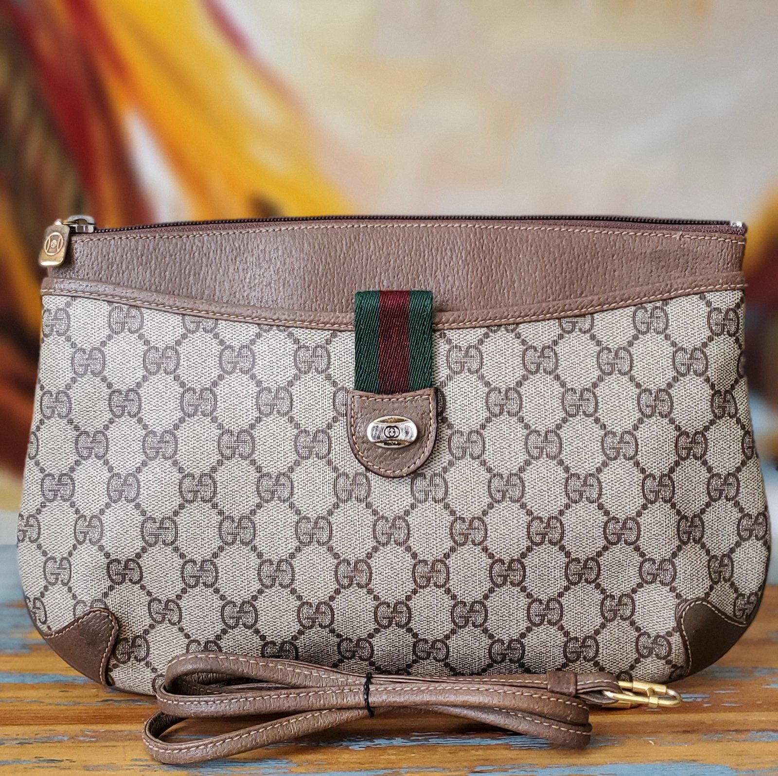 VINTAGE GUCCI FINDS — Vtg. Gucci Brown Monogram Clutch/Shoulder Bag.