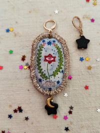 Image 1 of Mono orecchino Protezione 🏵️👁️✨