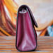 Image of Vtg Gucci Burgundy Mini Monogram Suede Clutch.