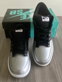 Image 1 of Nike SB Dunk Low Supreme Metallic Silver Size 12