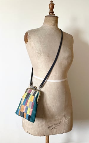 Image of Patchwork mosaic, slim kisslock shoulder bag with plant-dyed panels and crossbody strap