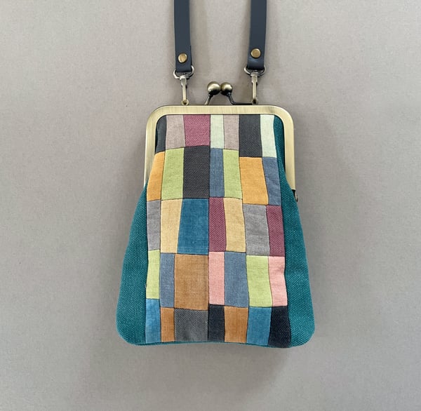 Image of Patchwork mosaic, slim kisslock shoulder bag with plant-dyed panels and crossbody strap