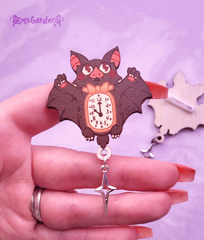 Image of Batty Clock Wooden Brooch with Silver Star