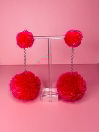 Image 3 of single color double pom pom earrings