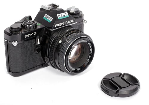 Image of Pentax MV-1 35mm SLR Film Camera with 50mm F2 SMC A lens #0407