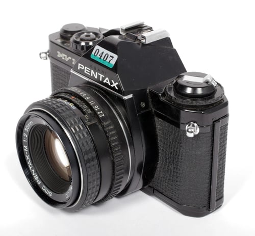 Image of Pentax MV-1 35mm SLR Film Camera with 50mm F2 SMC A lens #0407