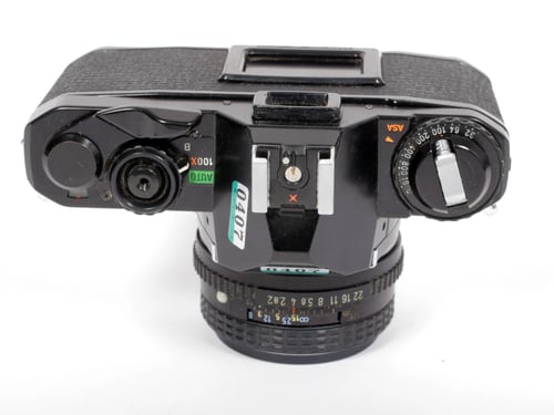 Image of Pentax MV-1 35mm SLR Film Camera with 50mm F2 SMC A lens #0407