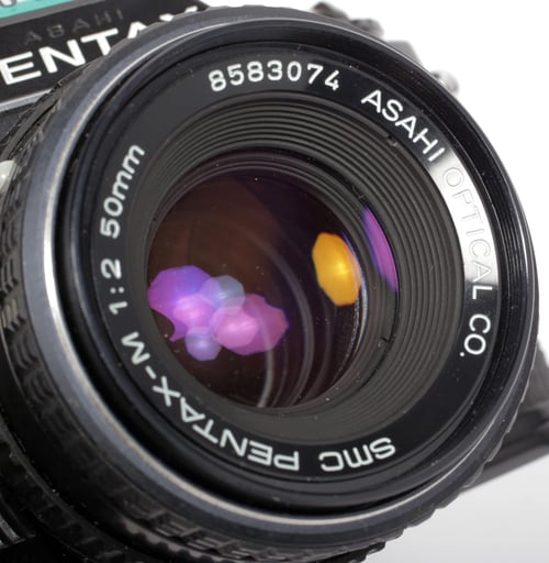 Image of Pentax MV-1 35mm SLR Film Camera with 50mm F2 SMC A lens #0407