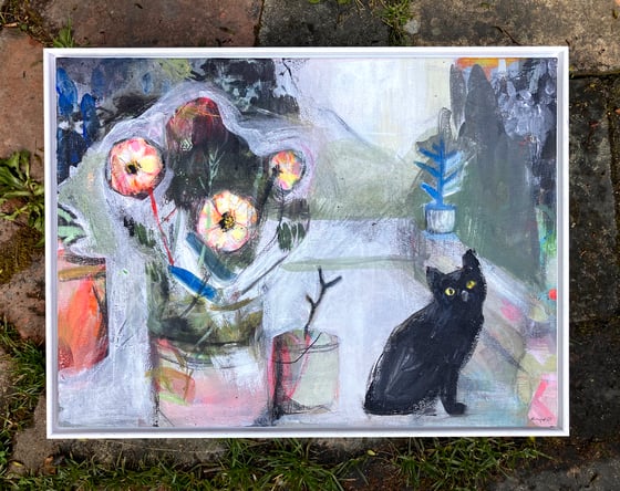 Image of The cat and the Daliahs
