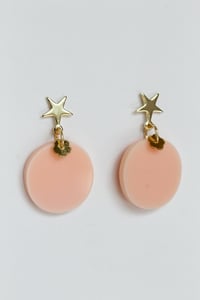 Image 2 of Peach dangly acrylic round earrings with star-shaped post