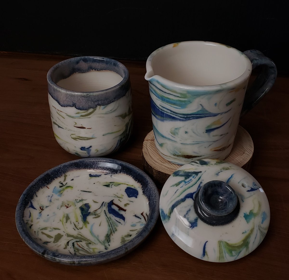 Image of 6 oz. (175 ml) Marbled Tea Steeper with Cup and Saucer 04202501