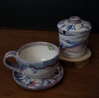 Image 4 of Discounted 6 oz. (175 ml) Marbled Tea Steeper with Cup and Saucer 04202502
