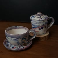 Image 1 of Discounted 6 oz. (175 ml) Marbled Tea Steeper with Cup and Saucer 04202502