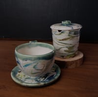 Image 2 of 6 oz. (175 ml) Marbled Tea Steeper with Cup and Saucer 04202503