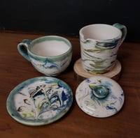 Image 5 of 6 oz. (175 ml) Marbled Tea Steeper with Cup and Saucer 04202503