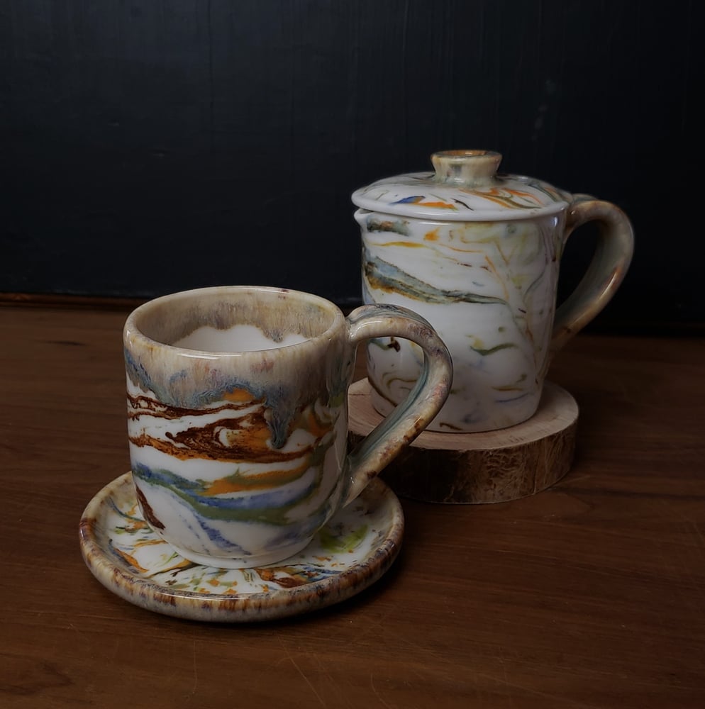Image of 6 oz. (175 ml) Marbled Tea Steeper with Cup and Saucer 04202504