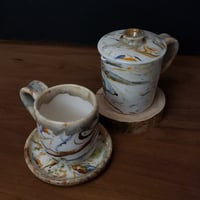 Image 4 of 6 oz. (175 ml) Marbled Tea Steeper with Cup and Saucer 04202504