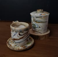 Image 2 of 6 oz. (175 ml) Marbled Tea Steeper with Cup and Saucer 04202504