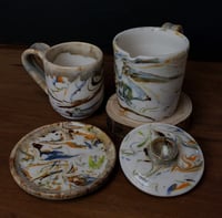 Image 5 of 6 oz. (175 ml) Marbled Tea Steeper with Cup and Saucer 04202504
