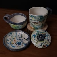 Image 5 of 6 oz. (175 ml) Marbled Tea Steeper with Cup and Saucer 04202505