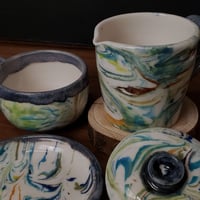Image 6 of 6 oz. (175 ml) Marbled Tea Steeper with Cup and Saucer 04202505