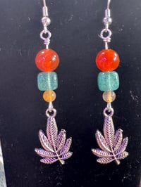 Image 1 of Leaf dangles with Rasta 