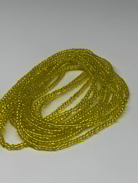 Image 1 of Sliver Lined Yellow 