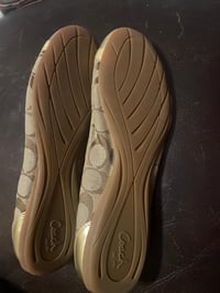 Image 1 of Coach flat shoes.