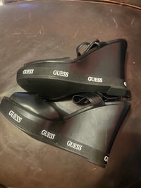 Image 3 of Black wedging sandal.