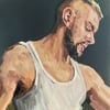 Martijn in a white vest 