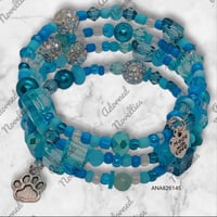 Image 1 of ANA826145 - Lt. Blue Memory Wire Bracelet w/Silver Charm